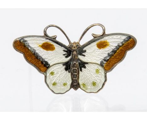 A Norwegian silver and enamel butterfly brooch, with wings decorated with cream and brown enamels, size approx 36mm x 20mm, g