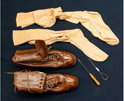 A pair of short brown ladies boots, ankle length with lace fastenings, 1890/1905 new and never worn and a pair of blush early
