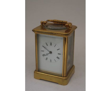 Early 20th Century brass French carriage clock with cracked side panel