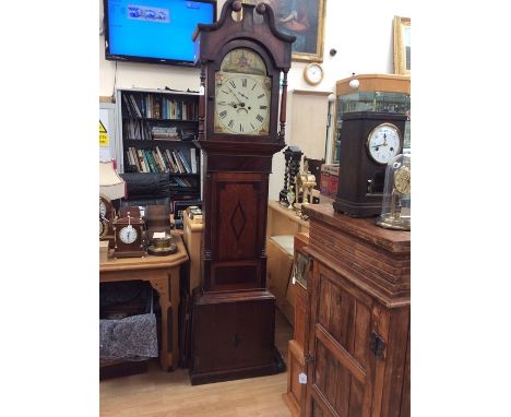 An early 19th Century oak and mahogany longcase clock, eight day movement and having a white enamelled 13 inch painted dial, 