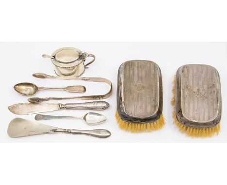 A group of silver to include: pair of Edwardian silver mounted brushes, engine turned with central monogram, by HM, Birmingha