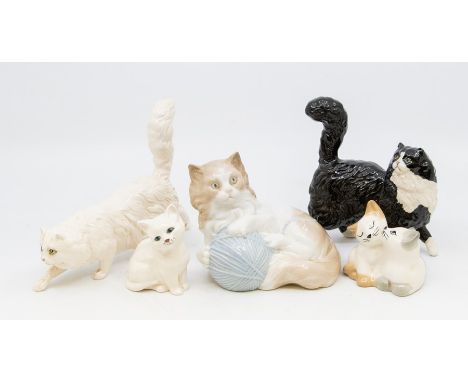 Cats: A NAO cat with a ball of wool; three Royal Doulton Cats - black &amp; white, white seated and White ready to pounce wit