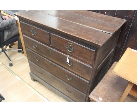 A mid 18th Century joined oak chest of drawers, circa 1760, of frame and panel construction, comprising two short over three 