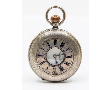 An early 20th Century silver Camerer Kuss & Co London  half hunter pocket watch, engine turned case with blue enamel Roman nu
