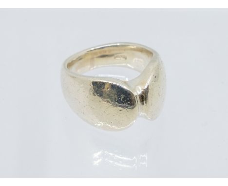 A Georg Jensen silver ring, No 100 by Henning Koppel with post 1945 hallmarks & London import marks for 1972, size  K, weight
