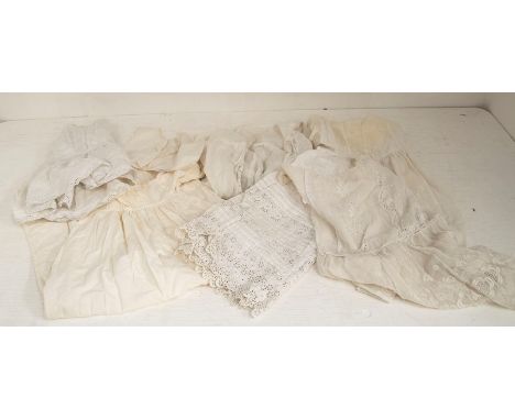 A collection of children's dresses to include a voile late Edwardian toddlers dress (damaged on the left shoulder); a 1920's 