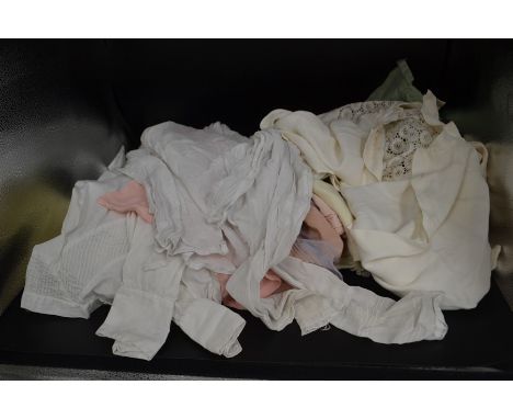 An assorted collection of vintage blouses to include 1920's cotton; in cotton 1930's in crepe and cotton; 1940's; an assortme