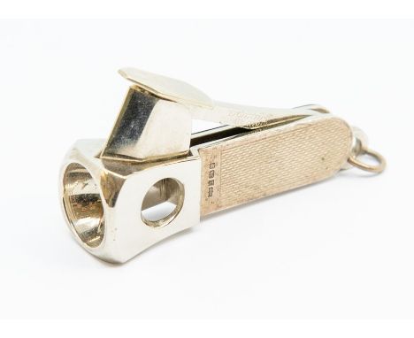 A Modern silver and silver plate cigar cutter, the silver engine turned body by Mappin &amp; Webb, Birmingham, 1996, length 5