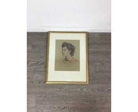 PORTRAIT OF A LADY,pencil on paper, signed and dated '50, mounted, framed and under glass.
