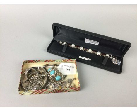 COLLECTION OF SILVER JEWELLERY,including rings, brooches, pendants and a bangle