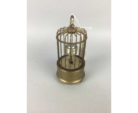 VINTAGE NOVELTY BIRDCAGE CLOCK,in brass with Arabic numerals, 12cm high