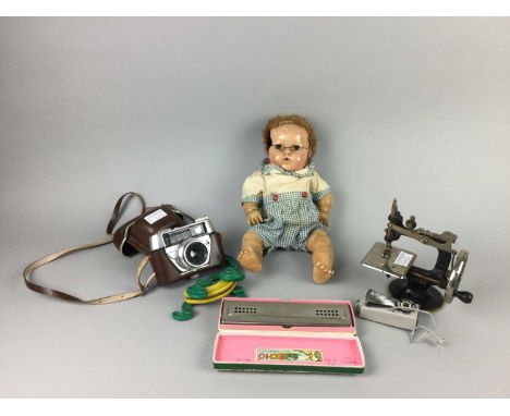 BOXED KNITMASTER,made in Japan, along with vintage toys including a doll, a miniature Singer sewing machine, an Echo harp, a 