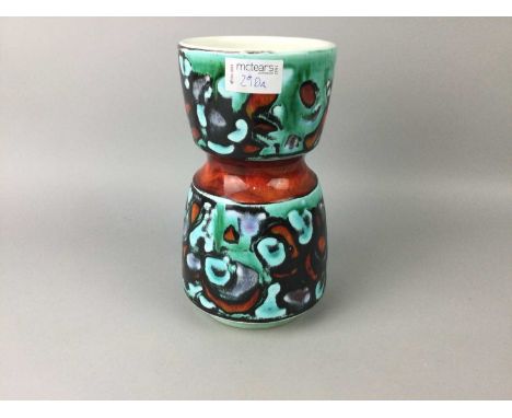 POOLE POTTERY VASE,23cm high, along with a pair of white metal peacock menu holders (3)Condition report: The condition of the