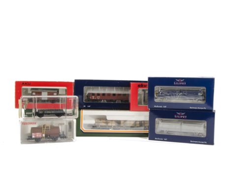 HO Gauge Swiss Freight Stock by HAG Liliput and others: comprising HAG tanker ref 383 'Tamoil', timber wagon with load ref 34