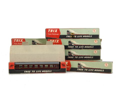 Trix Twin Railway OO Gauge Plastic Coaching Stock: nine late-issue 'scale-length' tinplate bogie coaches, in maroon with ligh