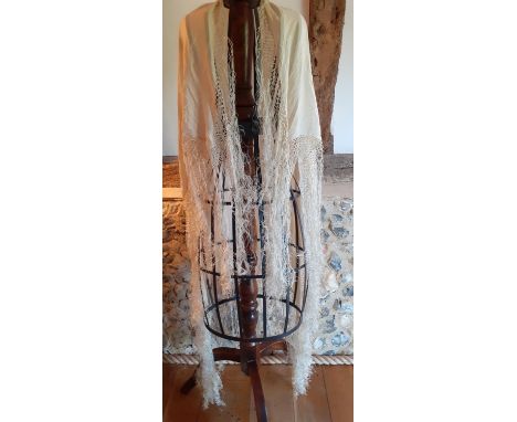 Two early 20th Century silk shawls, one black and one cream with  crotchet fringes and extra long cream tassels.  Location:Ra
