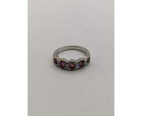 A 18ct white gold ring set with diamonds and rubies, total weight 4.4g Location: 