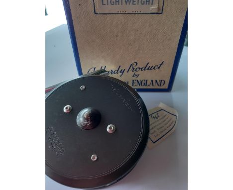 A Hardy 'The Lightweight' fly fishing reel with original box and returns ticket No:465. Location:1.2 