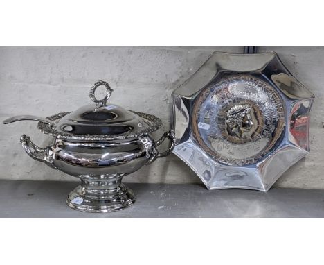 A silver plated twin handled lidded soup tureen and ladle, together with a silver plated silver jubilee charger.Location: 