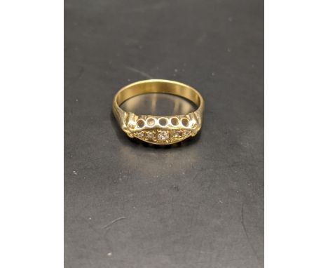 A 9ct gold ring set with diamonds, total weight 3.2gLocation: 