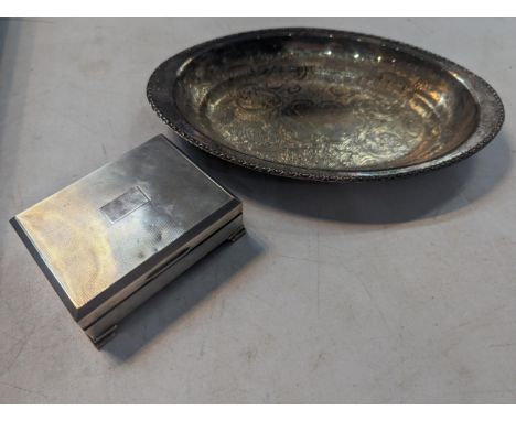 A mid-20th century silver cigarette case of rectangular form having an engine turned hinge lid and wooden interior, together 