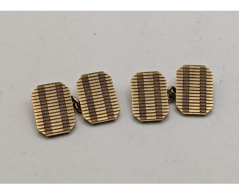 A pair of 9ct gold engine turned cufflinks total weight 11.4g.Location: 