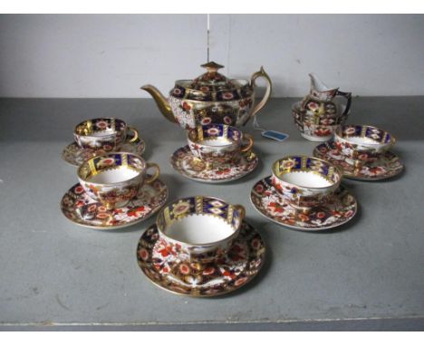 An Imari pattern part tea set to include Royal Crown Derby and Hammersley pieces and others, comprising 16 pieces.Location: 