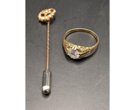 A 9ct gold and paste stone ring, together with a yellow metal stick pin tested as 9ct, total weight 4.1gLocation: 