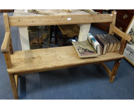 A 19TH CENTURY STRIPPED PINE HALL BENCH, stamped, "WINDSOR CASTLE SERVANTS" to the rear, 122cm wide