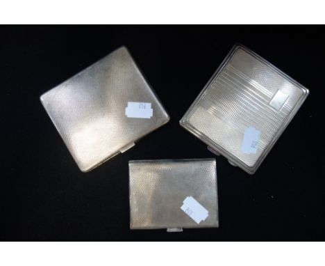 AN ART DECO ENGINE TURNED SILVER CIGARETTE CASE, and two others similar (c. 10.3oz) (3)