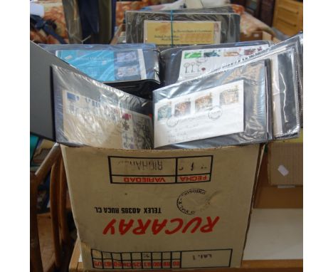 A LARGE COLLECTION OF STAMPS, in albums and First day covers