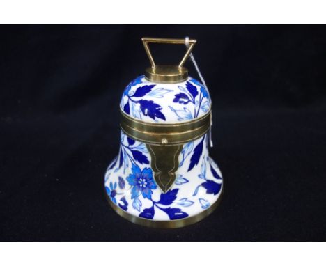 A VICTORIAN BLUE AND WHITE CERAMIC BISCUIT BARREL in the form of a bell, with brass fittings, 17cm high