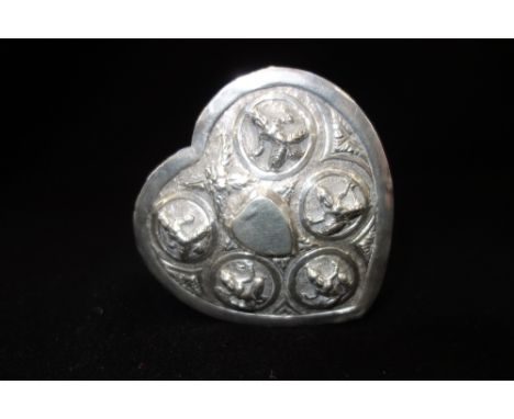 INDIAN WHITE METAL TRINKET BOX, in the form of a love heart, embossed with deities in segmented panels (c. 2.7oz)