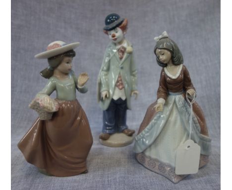 A LLADRO CLOWN, a Lladro girl and a Nao girl (3)