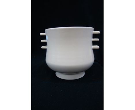 A POOLE POTTERY PLAIN WARE 'PASTEL PINK' ART DECO FINNED JARDINIERE, designed by John Adams 
