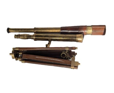 A brass and tan leather clad three draw telescope, 19th century, 63cm overall, together with another brass telescope and stan