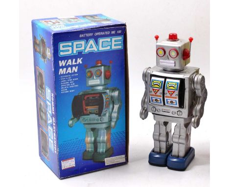 A Space Walk Man tinplate toy robot, battery operated, h.31cm, in pictorial card box