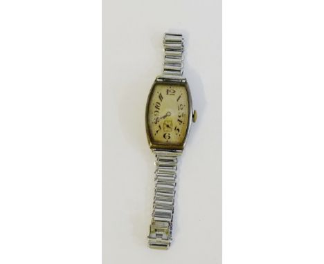 An Art Deco Lady's silver cased wristwatch, the silvered dial with Arabic numerals and subsidiary seconds dial 