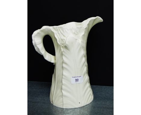 A Royal Worcester cream glazed leaf moulded porcelain jug with puce backstamp, 26cm high