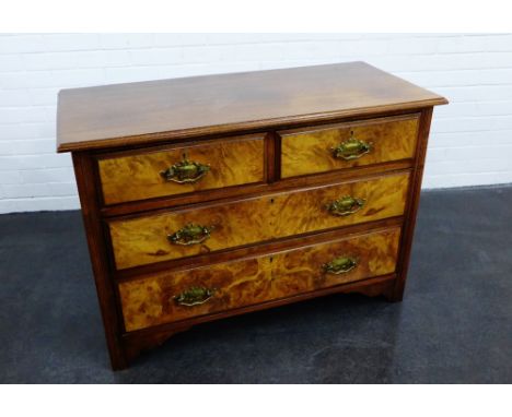 A mahogany and burrwood chest with the rectangular top above two short drawers and two long, 76 x 108cm
