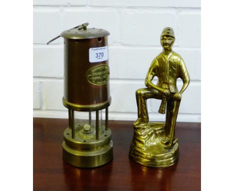A brass miners lamp, together with a brass figure of a miner, tallest 21cm, (2) 