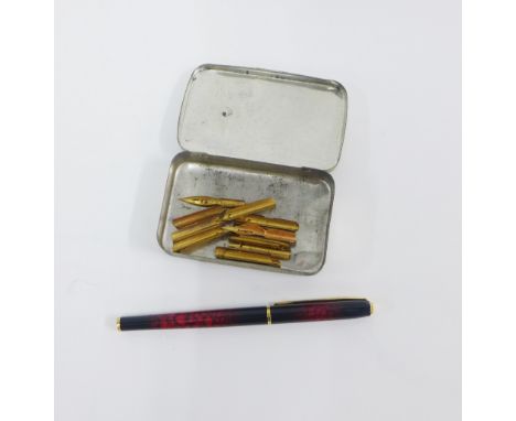 Elysee red marbled fountain pen and a selection of vintage fountain pen nibs (a lot) 