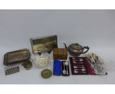A carton containing a quantity of Epns wares, mother of pearl handed knives, etc (a lot) 