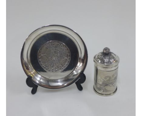 Mexican silver dish with an Aztec pattern, stamped 925, 11.5cm, together with a Chinese white metal cylindrical box and cover