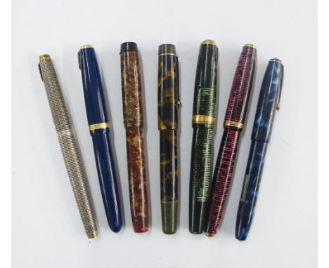 A collection of vintage fountain pens to include Parker, etc, some with 14k gold nibs (7)