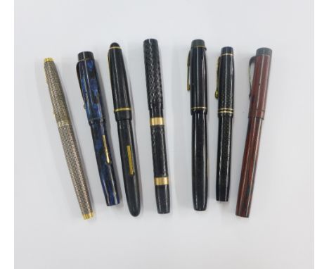 A collection of vintage fountain pens to include Waterman's and parker, etc, some with 14k gold nibs (7)
