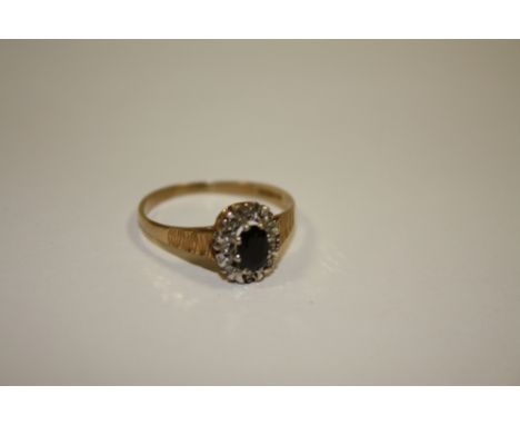 A LADIES 9CT GOLD SAPPHIRE AND DIAMOND DRESS RING 