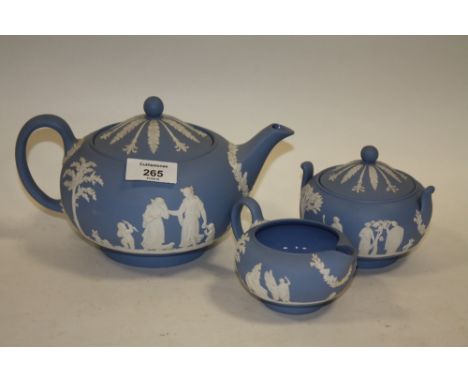 THREE PIECES OF WEDGWOOD BLUE JASPERWARE TO INCLUDE A TEAPOT TOGETHER WITH A SIMILAR TANKARD (4) 