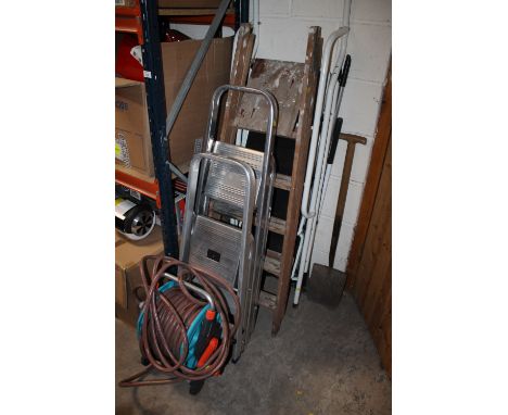 FOUR SETS OF LADDERS TOGETHER WITH GARDEN TOOLS