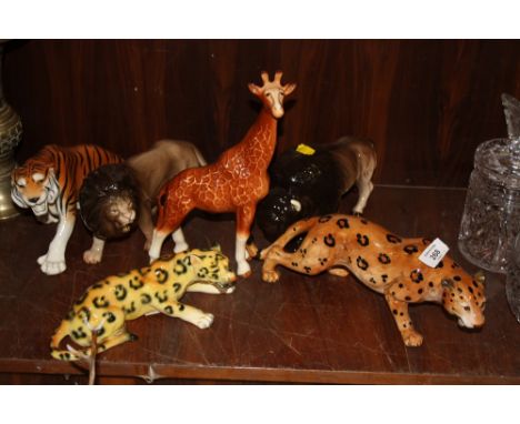 THREE CERAMIC BIG CAT FIGURES TO INCLUDE A MELBA WARE LION  TOGETHER WITH THREE CERAMIC ANIMAL FIGURES TO INCLUDE A MELBA WAR